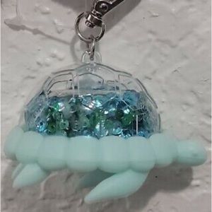 NWT Bath and Body Works. SEQUIN TURTLE Pocket - Bac Holder